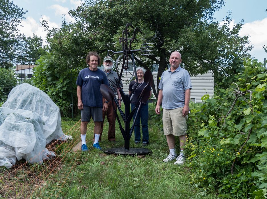 Paul, Egils, Joyce, and Tom with sculpture by Joyce for Paul.<br />July 10, 2015 - At Paul and Norma's in Tewksbury, Massachusetts.