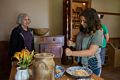 Miranda squashing lemons and Joyce.<br />July 14, 2015 - Biliings Farm and Museum in Woodstock, Vermont.