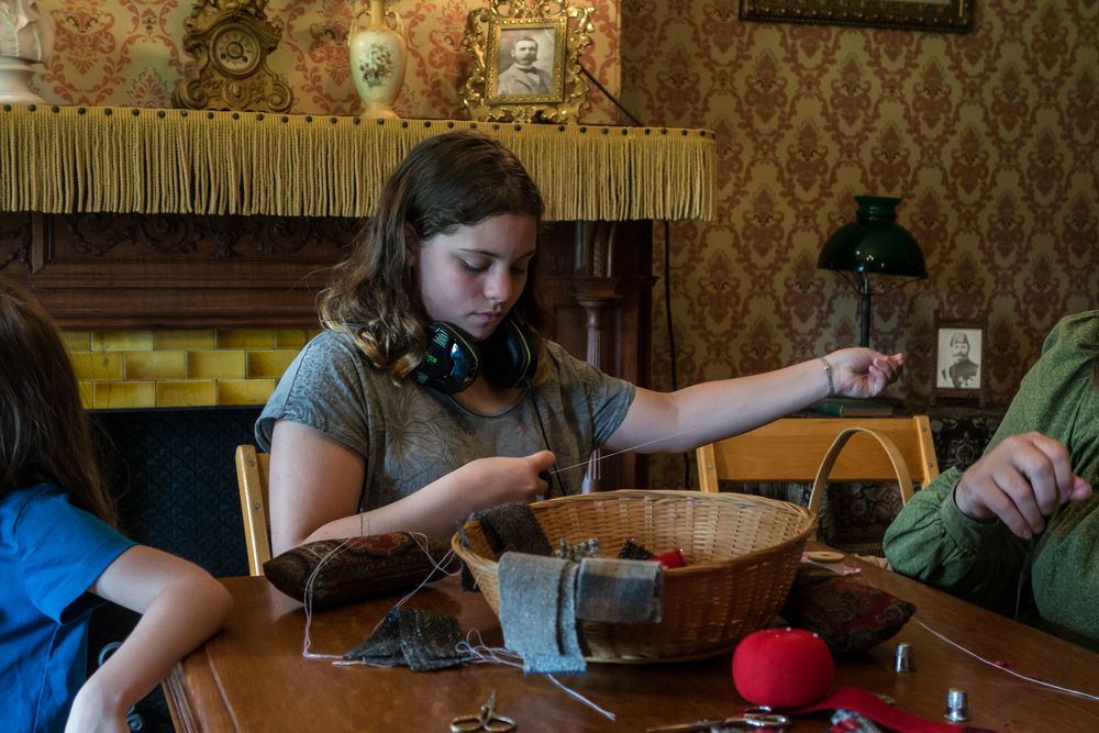 Miranda sewing a book mark.<br />July 14, 2015 - Biliings Farm and Museum in Woodstock, Vermont.