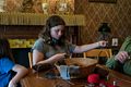 Miranda sewing a book mark.<br />July 14, 2015 - Biliings Farm and Museum in Woodstock, Vermont.