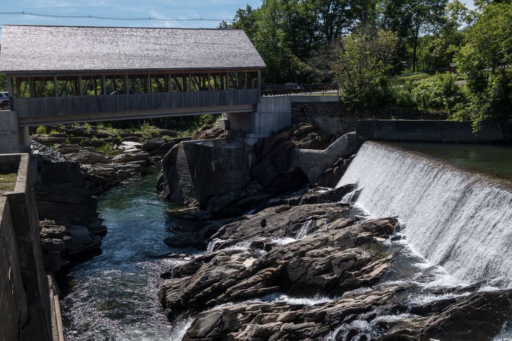 Dam and covered bridge along the Ottauquechee River.<br />July 16, 2015 - At the Simon Pearce Glass works in Quechee, Vermont.