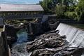 Dam and covered bridge along the Ottauquechee River.<br />July 16, 2015 - At the Simon Pearce Glass works in Quechee, Vermont.