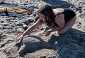 Miranda making a turtle.<br />July 16, 2015 - At Short Sands Beach in York, Maine.