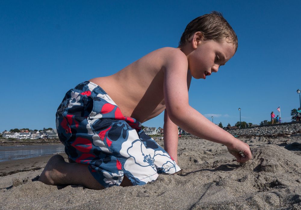 Matthew making a turtle.<br />July 16, 2015 - At Short Sands Beach in York, Maine.