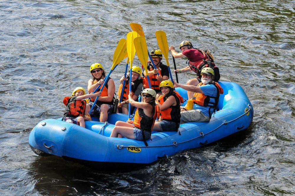 Matthew, Henry, Joyce, Holly, Carl, Miranda, Geeg (guide), and Egils.<br />Photo by  Bob Story Photography.<br />Rafting on the Deerfield River.<br />July 27, 2015 - Charlemont, Massachusetts.