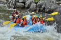Geeg, Carl, Holly, Miranda, Egils, Joyce, Matthew, and Henry in level 3 rapids.<br />Photo by  Bob Story Photography.<br />Rafting on the Deerfield River.<br />July 27, 2015 - Charlemont, Vermont