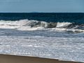 Wave with Mt. Agamenticus over the horizon.<br />Sep. 24, 2015 - Parker River National Wildlife Refuge, Plum Island, Massachusetts.