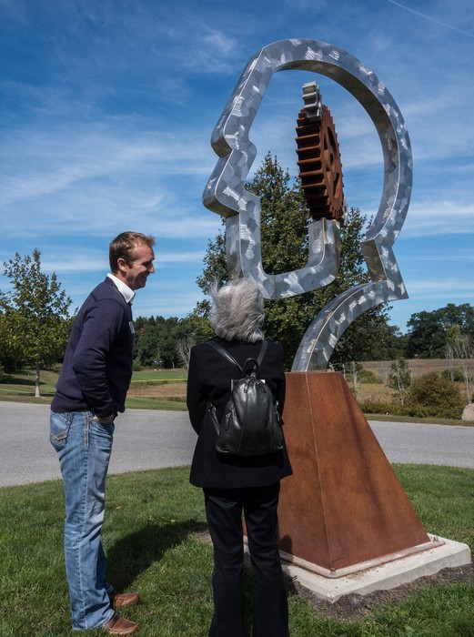 Dale and Joyce in front of one of Dale's sculptures.<br />Sep. 26, 2015 - Pingree School, Hamilton, Massachusetts