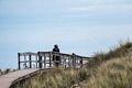 Joyce on boardwalk from parking lot #6.<br />Nov. 6, 2015 - Parker River National Wildlife Refuge, Plum Island, Massachusetts.