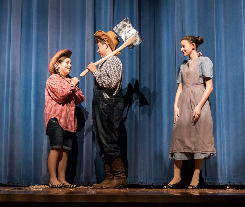 Fern convinces her father not to kill the piglet.<br />A performance of 'Charlotte's Web' at the Miscoe Hill Middle School.