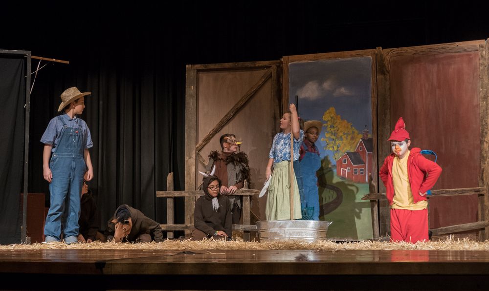 Chet as Uncle Homer, Emma as Aunt Edith, Darryl as Lurvy, Jacob the rooster, and other farm animals.<br />A performance of 'Charlotte's Web' at the Miscoe Hill Middle School.