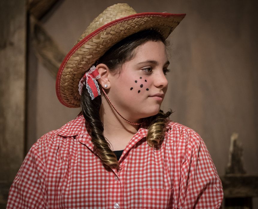 Fern listening.<br />A performance of 'Charlotte's Web' at the Miscoe Hill Middle School.