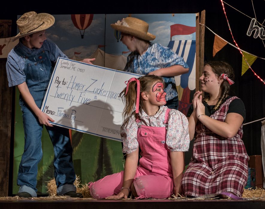 A big check for Uncle Homer and Aunt Edith.<br />A performance of 'Charlotte's Web' at the Miscoe Hill Middle School.