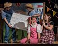 A big check for Uncle Homer and Aunt Edith.<br />A performance of 'Charlotte's Web' at the Miscoe Hill Middle School.