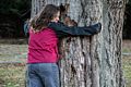 Tree hugger Miranda.<br />Dec. 5, 2015 - Maudslay State Park, Newburyport, Massachusetts.