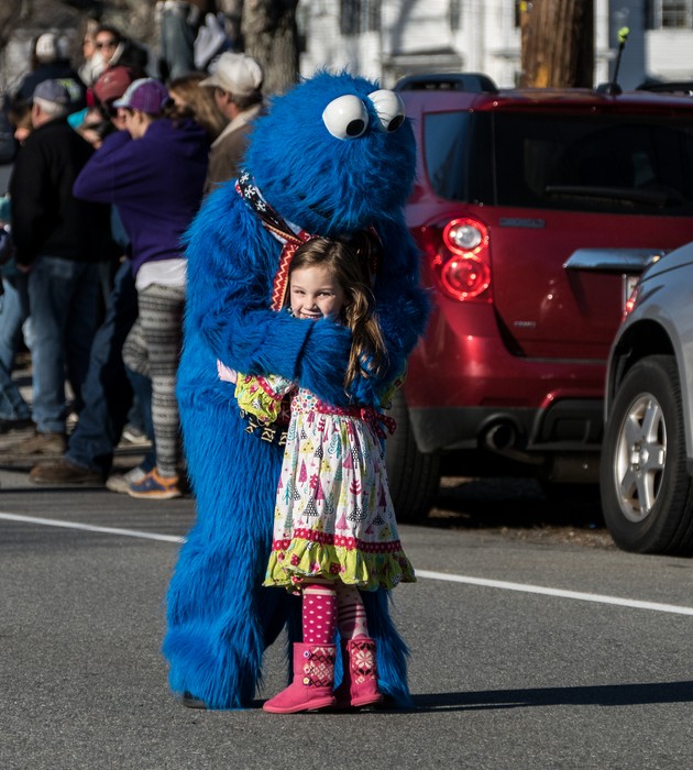 Cookie Monster and girl.<br />Santa Parade.<br />Dec. 6, 2015 - Merrimac, Massachusetts.
