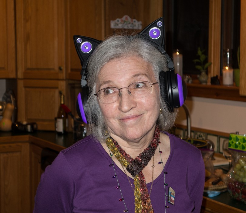 Joyce wearing headphones that we gave to Miranda.<br />Dec. 24, 2015 - Christmas eve at home in Merrimac, Massachusetts.