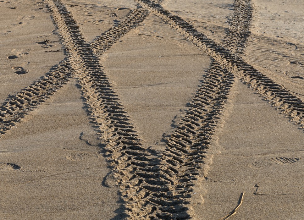 Tire tracks on the beach.<br />Dec. 25, 2015 - Parker River National Wildlife Refuge, Plum Island, Massachusetts.