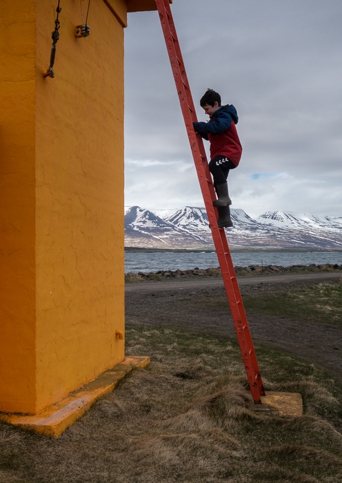 Marks clinbing down from the lighthouse.<br />May 25, 2015 - Svalbarsstrnd, Iceland