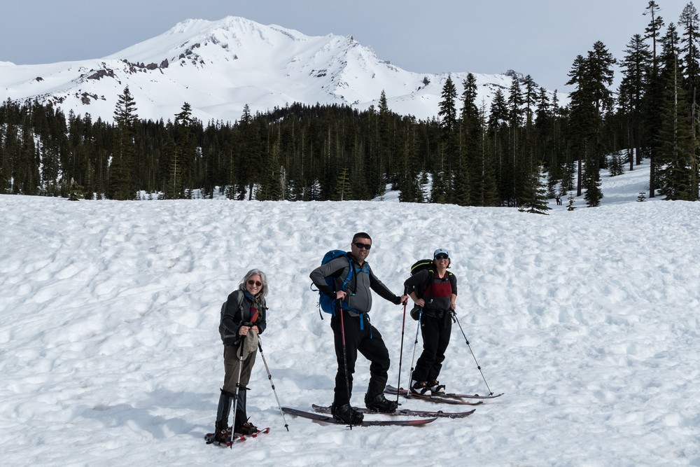 Joyce, Sati, and Melody with Mt. Shasta in back.<br /> Feb. 16, 2016 - Above Bunny Flat on skirt of Mt. Shasta, California.