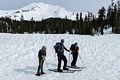 Joyce, Sati, and Melody with Mt. Shasta in back.<br /> Feb. 16, 2016 - Above Bunny Flat on skirt of Mt. Shasta, California.