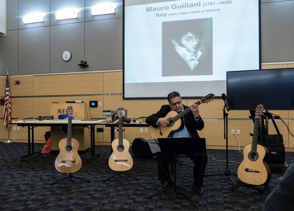 Robert Ward demonstrating some of Oscar's guitars.<br />Presentation by Oscar on science, math, and music.<br />March 9, 2016 - Northern Essex Community College, Haverhill, Massachusetts.