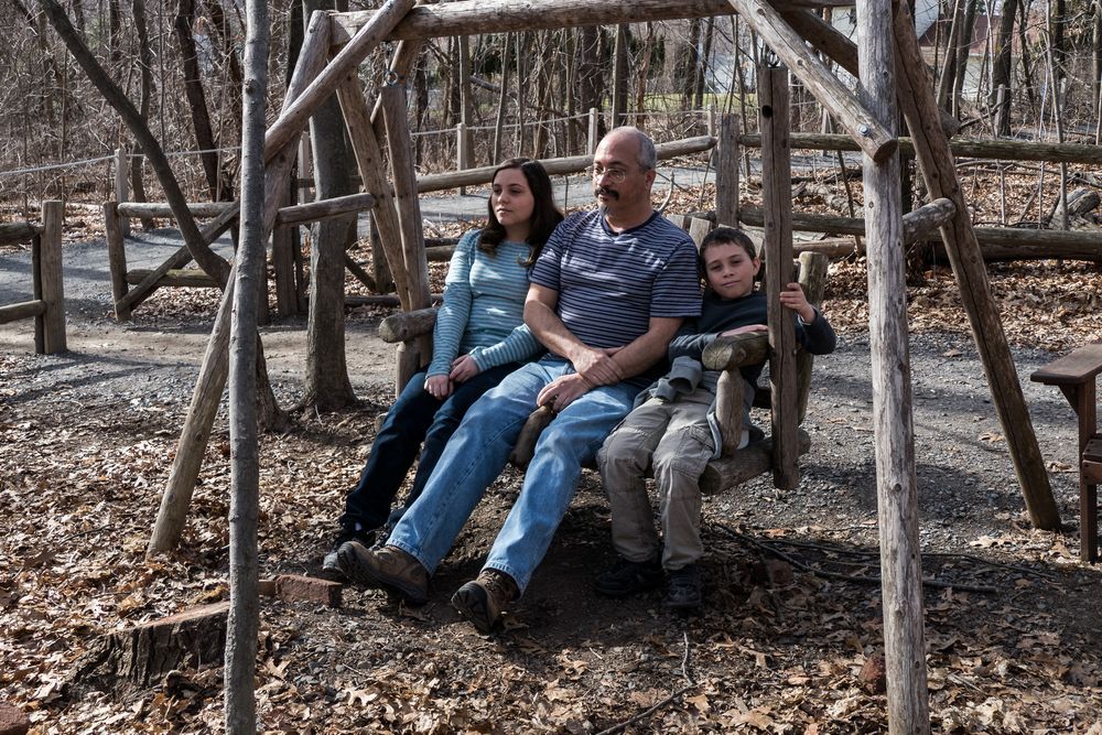 Miranda, Carl, and Matthew relaxing in a swing.<br />Broad Meadow Brook Conservation & Wildlife Sanctuary.<br />March 13, 2016 - Worcester, Massachusetts.
