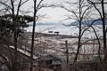 View south along the Hudson River to Manhattan and the George Washington Bridge from the public library.<br />March 23, 2016 - Hasting-On-Hudson, New York.
