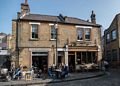 Joyce, Rob, and Stephanie.<br />In addition to selling old records, this place provided us with coffee and goodies.<br />May 22, 2016 - Columbia Road Flower Market, London, UK.