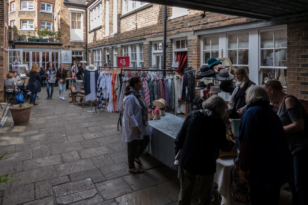 Joyce and Stephanie found another corner full of stuff.<br />May 22, 2016 - Columbia Road Flower Market, London, UK.