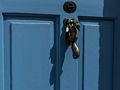 A squirrel for a door knocker.<br />May 22, 2016 - Columbia Road Flower Market, London, UK.