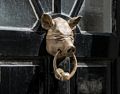 A blind pig for a door knocker.<br />May 22, 2016 - Columbia Road Flower Market, London, UK.