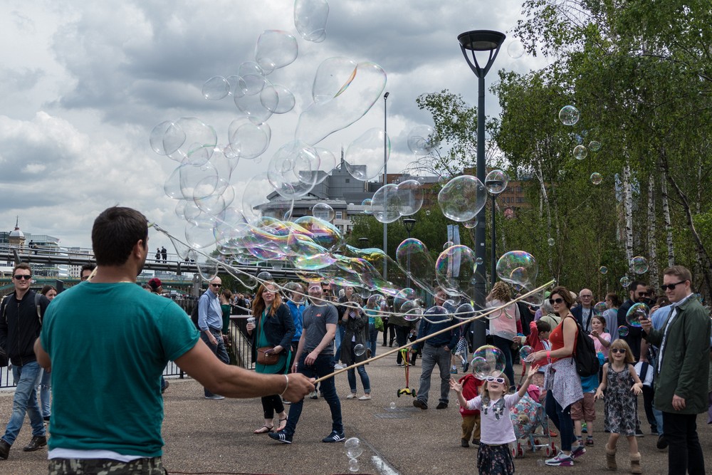 Bubble guy next to the Tate Modern.<br />May 22, 2016 - London, UK.