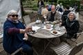 Stepahnie, Rob, and Joyce at tea time.<br />The Chelsey Physic Garden.<br />May 22, 2016 - London, England.