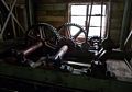 The waterwheel pumps water via these gears, cranckshaft and lever (the pump is to the left out of sight in the photo).<br />May 23, 2016 - Painshill Park, Cobham, Surrey, England.