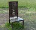 One of the twelve chairs of The Jurors artwork by Hew Locke.<br />Runnymede Meadows.<br />May 26, 2016 - Between Old Windsor and Egham, England.