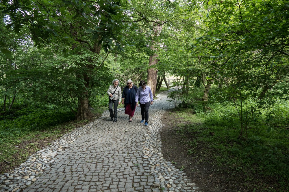 Joyce, Stephanie and Shelagh heading for the Kennedy Memorial.<br />Runnymede Meadows.<br />May 26, 2016 - Between Old Windsor and Egham, England.