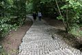 Stephanie and Shelagh heading for the Kennedy Memorial.<br />Runnymede Meadows.<br />May 26, 2016 - Between Old Windsor and Egham, England.