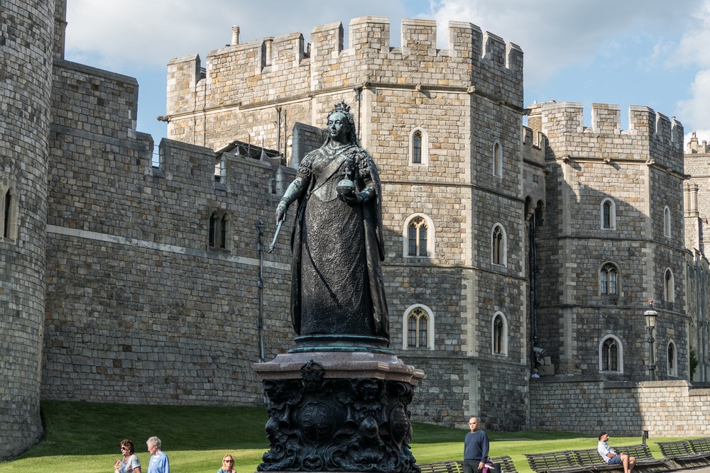 Queen Victoria statue and Windsor Castle.<br />May 26, 2016 - Windsor, UK