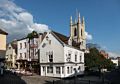 Behind the white building in the foreground is <br />St John the Baptist Windsor Parish Church.<br />May 26, 2016 - Windsor, UK