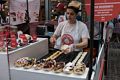 Small pancakes in a boat.<br />Greenwich Market.<br />May 28, 2016 - Greenwich, UK.