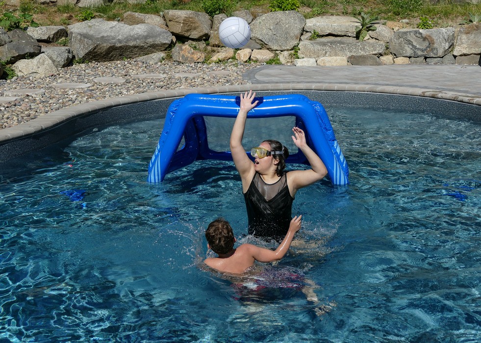 Matthew and Miranda enjoying one of the presents.<br />Matthew's family birthday celebration.<br />June 19, 2016 - At Carl and Holly's in Mendon, Massachusetts.