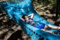 Matthew relaxing in the hammock village.<br />July 20, 2016 - At Le Shahlet in McCloud, California.