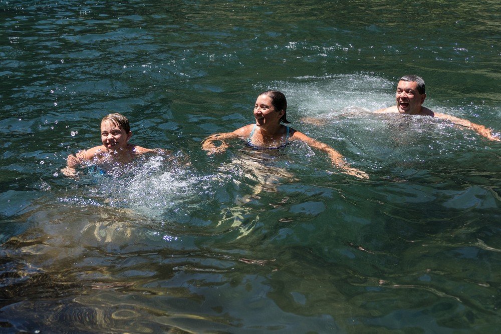 Matthew, Melody, and Sati in cold pool below Upper Falls.<br />July 20, 2016 - Along the shore of the McCloud River, California.