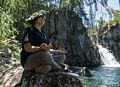 Miranda with a leaf for a hat.<br />July 20, 2016 - Along the shore of the McCloud River, California.