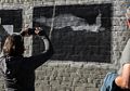 Melody photographing one of the murals.<br />Off H Street between 9th and 10th Streets.<br />July 22, 2016 - Arcata, Calofornia.