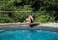 Gujn doing a flip.<br />Partial family get-together at the pool.<br />Aug. 11, 2016 - At Carl and Holly's in Mendon, Massachusetts.