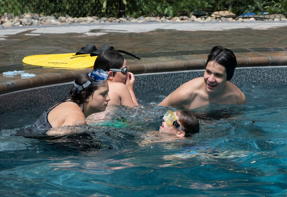 Miranda, Marks, Matthew, and Gujn.<br />Partial family get-together at the pool.<br />Aug. 11, 2016 - At Carl and Holly's in Mendon, Massachusetts.