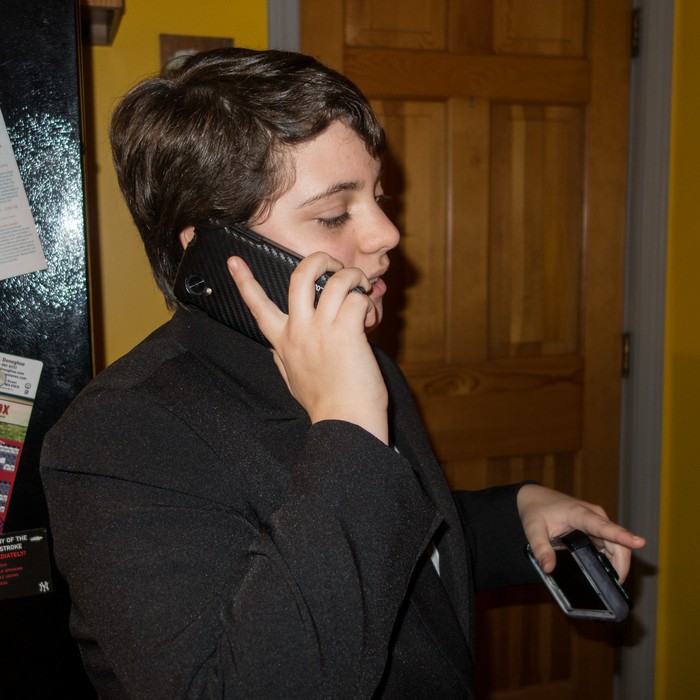 Miranda talking to Melody on the cell phone.<br />Thanksgiving dinner.<br />Nov. 24, 2016 - At Paul and Norma's in Tewksbury, Massachusetts.