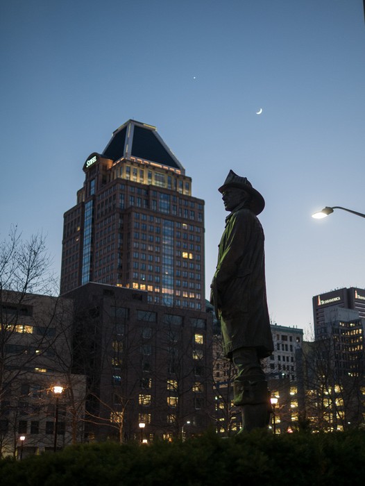 Fireman sculpture in twilight.<br />Jan. 1, 2017 - Baltimore, Maryland